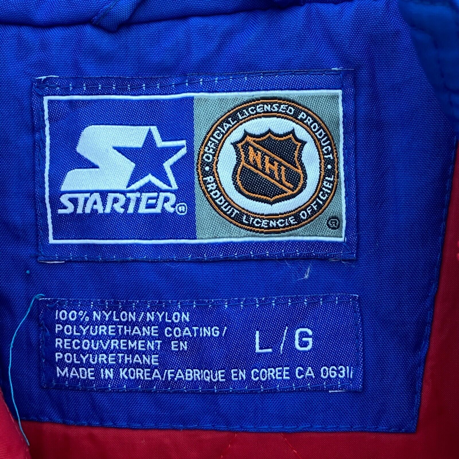 The Montreal Canadiens NHL Starter Quarter Zip Insulated Red Jacket Size L